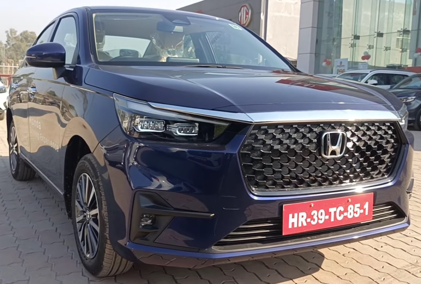 KTS Honda Amaze sedan category vehicle for Srinagar airport transfers